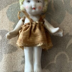 Porcelain Doll with Brown Dress